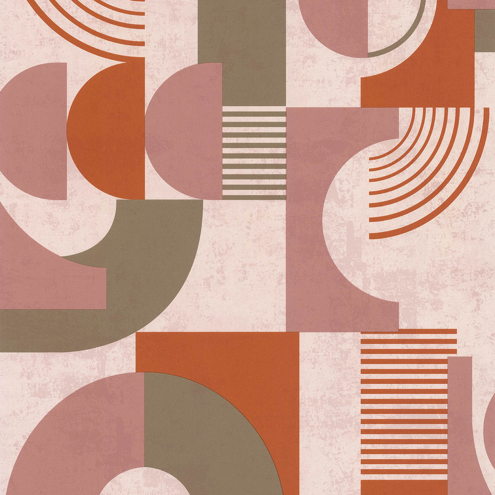 Papier peint vinyle sur intissé motif Seventie's rose et terra, avec des formes géométriques rétro.