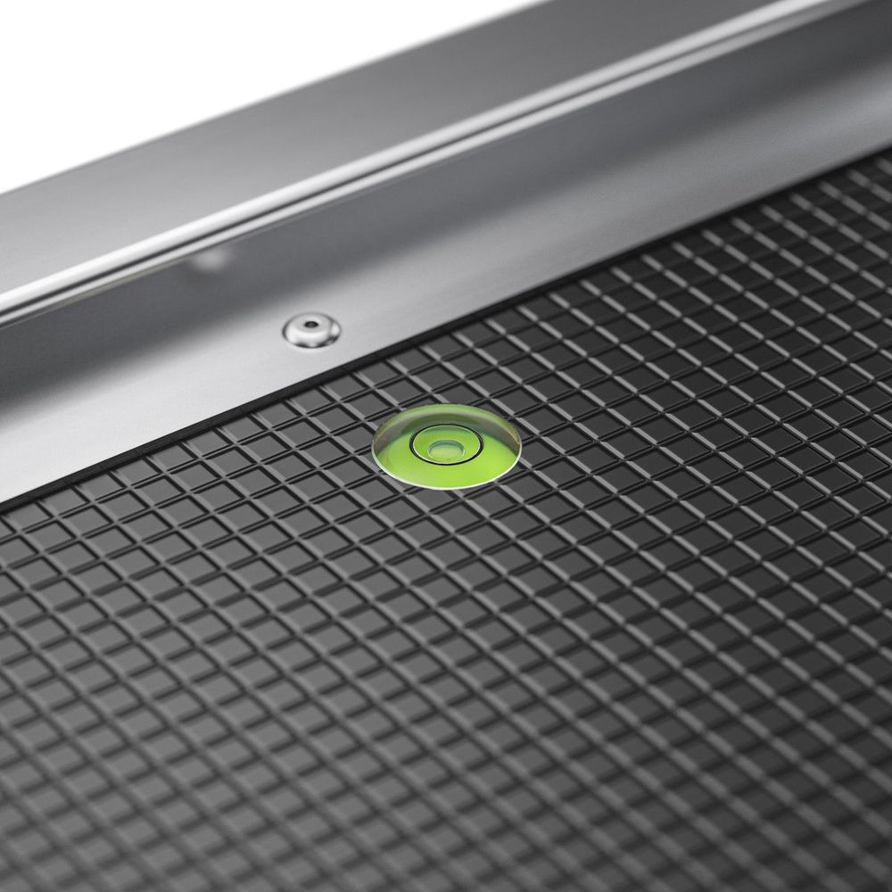 Niveau à bulle affleurant pour un ajustage sûr de la plateforme à l’horizontale