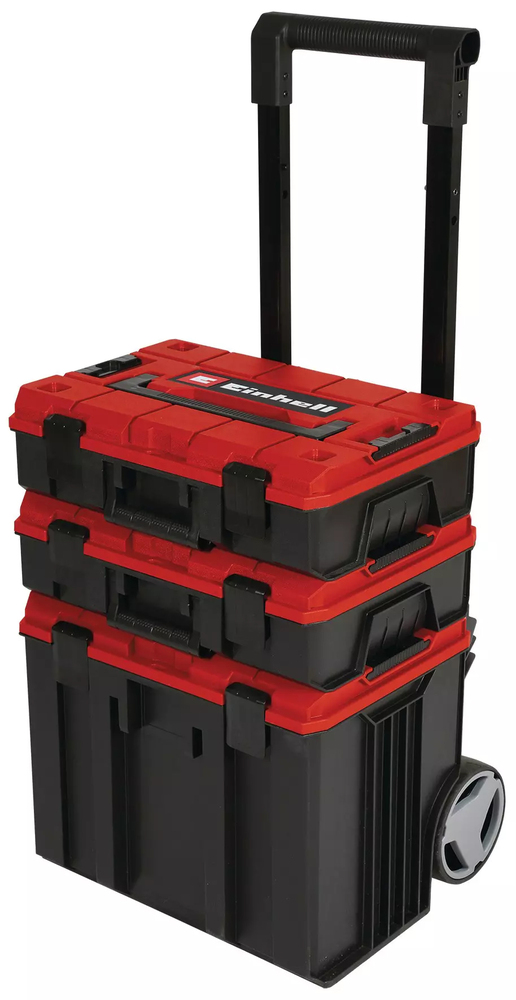 Système de rangement modulaire Einhell sur roulettes composé de trois mallettes empilables rouges et noires avec poignée télescopique.