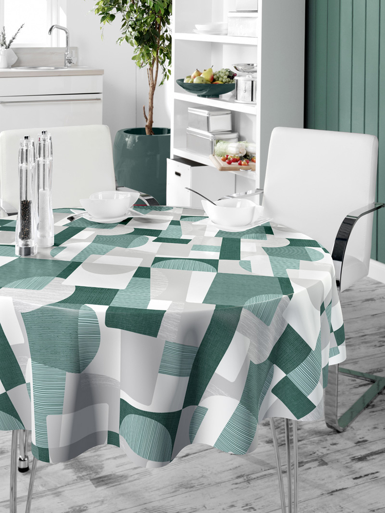Nappe ronde 160 cm au motif graphique contemporain vert, blanc et gris, composé de formes géométriques modernes pour une décoration dynamique et élégante.