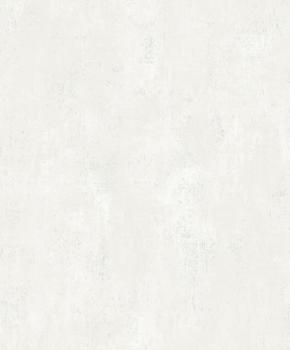 Papier peint vinyle sur intissé blanc craie uni, avec un aspect matière et une texture subtile