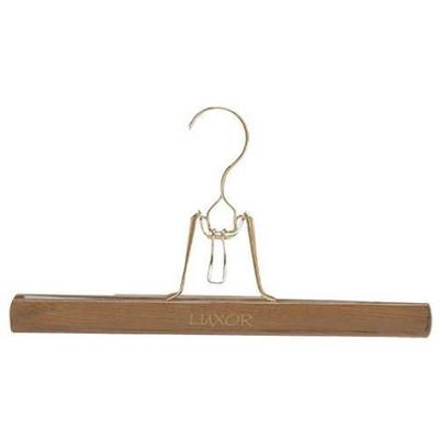 Cintre à pince pour jupes et pantalons en bois naturel verni de 32 cm avec pinces de maintien.