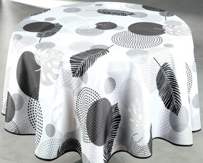 Nappe ronde 160 cm en polyester avec motif végétal graphique noir, gris et blanc, associant feuillages stylisés et formes abstraites pour une décoration moderne et épurée.